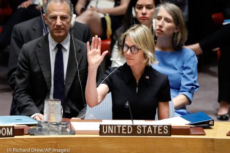 New U.S. Ambassador Kelly Craft raise her hand for her first vote as she attends her first Security Council meeting, at United Nations headquarters, Thursday, Sept. 12, 2019. (© Richard Drew/AP Images)