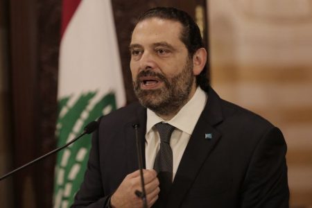 Lebanese Prime Minister Saad Hariri speaks during an address to the nation, in Beirut, Lebanon, Friday, Oct. 18, 2019.  Hariri has given his political adversaries a 72-hour ultimatum to back his reform agenda amid growing nationwide protests over country's worsening economic crisis. (AP Photo/Hassan Ammar)