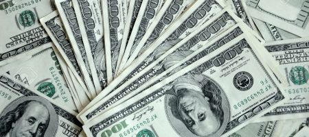 16439817-large-amount-of-money-american-dollars-cash-hundred-dollar-banknotes-mixed-together-