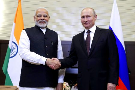 SOCHI, RUSSIA - MAY 21, 2018: India's Prime Minister Narendra Modi (L) and Russia's President Vladimir Putin shake hands during a meeting. Mikhail Metzel/TASS (Photo by Mikhail MetzelTASS via Getty Images)