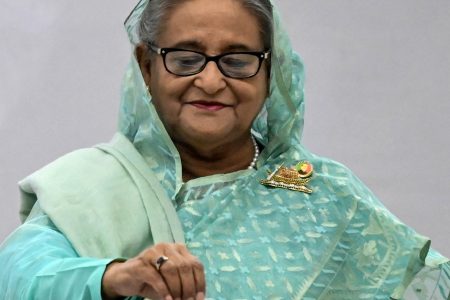 Bangladesh's Prime Minister Sheikh Hasina casts her vote at a polling station in Dhaka on January 7, 2024. Bangladesh began voting on January 7, in an election guaranteed to give a fifth term in office to Prime Minister Sheikh Hasina, after a boycott led by an opposition party she branded a "terrorist organisation". (Photo by AFP) (Photo by -/AFP via Getty Images)