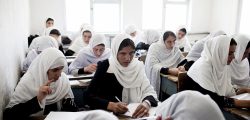 FILE -- Female Afghan students work during a class at the Jamal Agha Girls School in Kapisa Province, Afghanistan, June 29, 2010. The numbers of attacks on schools are down to an average of about eight  a month, less than half the monthly average recorded by the Education Ministry the previous two years. (Adam Ferguson/The New York Times)