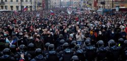 Law enforcement officers stand in front of participants during a rally in support of jailed Russian opposition leader Alexei Navalny in Saint Petersburg, Russia January 23, 2021. REUTERS/Anton Vaganov     TPX IMAGES OF THE DAY