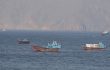 Ships and tankers in the Strait of Hormuz off the coast of Musandam, Oman, April 18, 2026. REUTERS