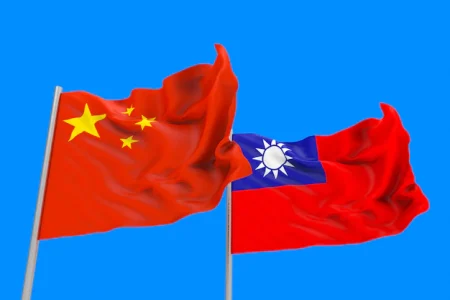 3d-rendering-flowing-china-taiwan-national-flags-with-clipping-path-isolated-blue-sky_25920-2296