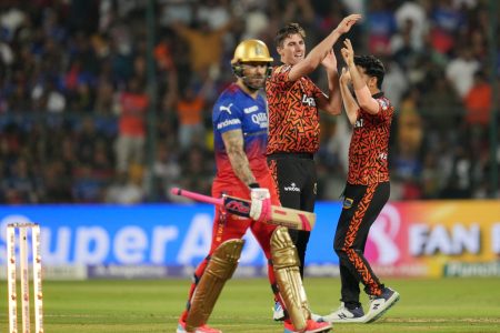 Pat Cummins (c) of Sunrisers Hyderabad celebrates the wicket of Faf Du Plessis (c) of Royal Challengers Bangalore  during match 30 of the Indian Premier League season 17 (IPL 2024) between Royal Challengers Bangalore and Sunrisers Hyderabad held at the M.Chinnaswamy Stadium, Bengaluru on the 15th April  2024.

Photo by Faheem Hussain/ Sportzpics for IPL