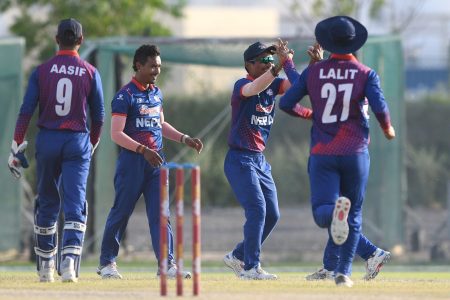 Team Nepal celebrates the wicket of Babar Hayat of Hong Kong, China during the ACC Men's Premier Cup 2024 3rd / 4th Place Play Off match between Nepal and Hong Kong, China held at the Al Amerat Cricket Ground Oman Cricket (Turf 1), Oman on April 20, 2024.

Photo by: Anshuman Akash / Creimas / Asian Cricket Council

RESTRICTED TO EDITORIAL USE