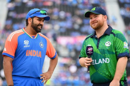 NEW YORK, NEW YORK - JUNE 05: Rohit Sharma of India and Paul Stirling of Ireland interact ahead of the ICC Men's T20 Cricket World Cup West Indies & USA 2024 match between India  and Ireland at  Nassau County International Cricket Stadium on June 05, 2024 in New York, New York. (Photo by Alex Davidson-ICC/ICC via Getty Images)