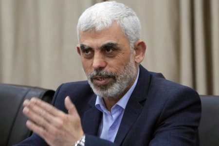 Yehia Sinwar, head of Hamas in Gaza, greets his supporters during a meeting with leaders of Palestinian factions at his office in Gaza City, Wednesday, April 13, 2022. The chief prosecutor of the International Criminal Court said Monday he is seeking arrest warrants for Israeli and Hamas leaders, including Israeli Prime Minister Benjamin Netanyahu, in connection with their actions during the seven-month war between Israel and Hamas. Yehia Sinwar is one of the three Hamas leaders believed to be responsible f