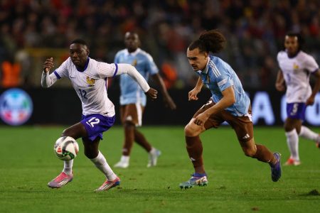 Soccer Football - UEFA Nations League - Group A2 - Belgium v France - King Baudouin Stadium, Brussels, Belgium - October 14, 2024 France's Randal Kolo Muani in action with Belgium's Arthur Theate REUTERS/Yves Herman