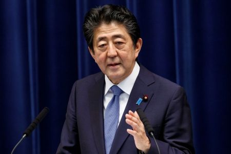 FILE PHOTO: Japanese Prime Minister Shinzo Abe speaks at a news conference at the prime minister's official residence in Tokyo, Japan June 18, 2020. Rodrigo Reyes Marin/Pool via REUTERS