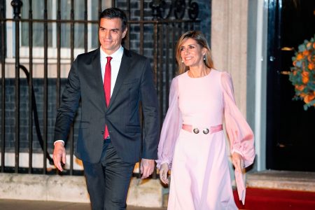 Spanish Prime Minister Pedro Sanchez and his wife Maria Begona Gomez Fernandez leave 10 Downing Street in central London on December 3, 2019, after attending a reception hosted by Britain's Prime Minister Boris Johnson ahead of the NATO alliance summit. - NATO leaders gather Tuesday for a summit to mark the alliance's 70th anniversary but with leaders feuding and name-calling over money and strategy, the mood is far from festive. (Photo by Niklas HALLE'N / AFP) (Photo by NIKLAS HALLE'N/AFP via Getty Images)