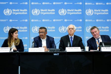 (from L to R)-: Dr. Maria D Van Kerkhove, Head AI Emerging Diseases and Zoonoses Unit, World Health Organization (WHO) Director-General Tedros Adhanom Ghebreyesus, Professor Didier Houssin, Chair of the Emergency Committee, and WHO health emergencies programme Michael Ryan sit together for a  press conference following an emergency committee meeting over new SARS-like virus spreading in China and other nations, in Geneva on January 22, 2020. - The coronavirus has sparked alarm because of its similarity to the outbreak of SARS (Severe Acute Respiratory Syndrome) that killed nearly 650 people across mainland China and Hong Kong in 2002-03. (Photo by PIERRE ALBOUY / AFP) (Photo by PIERRE ALBOUY/AFP via Getty Images)