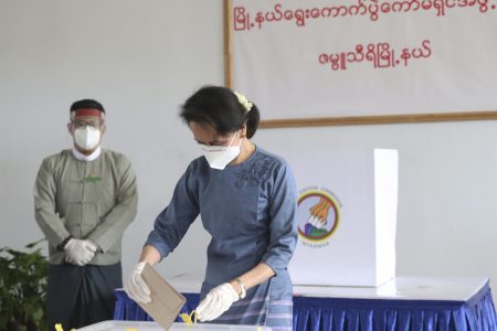 Myanmar's leader Aung San Suu Kyi makes an early voting for upcoming Nov. 8 general election at Union Election Commission office, Thursday, Oct. 29, 2020, in Naypyitaw, Myanmar. (AP Photo/Aung Shine Oo)