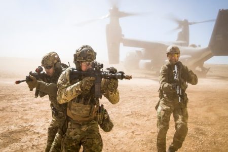 A joint special forces team move together out of a U.S. Air Force CV-22 Osprey Feb. 26, 2018, at Melrose Training Range, New Mexico. At Emerald Warrior, the largest joint and combined special operations exercise, U.S. Special Operations Command forces train to respond to various threats across the spectrum of conflict. (U.S. Air Force photo/Senior Airman Clayton Cupit)