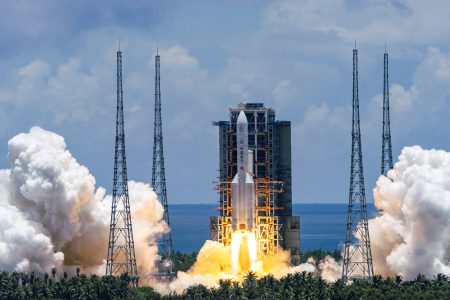 In this photo released by China's Xinhua News Agency, a Long March-5 rocket carrying the Tianwen-1 Mars probe lifts off from the Wenchang Space Launch Center in southern China's Hainan Province, Thursday, July 23, 2020. China launched its most ambitious Mars mission yet on Thursday in a bold attempt to join the United States in successfully landing a spacecraft on the red planet. (Cai Yang/Xinhua via AP)