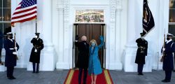 President Joe Biden and first lady Jill Biden wave as they arrive at the North Portico of the White House, Wednesday, Jan. 20, 2021, in Washington. (AP Photo/Alex Brandon, Pool)