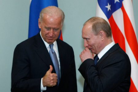 Vice President of the United States Joe Biden, left, geatures as he meets Russian Prime Minister Vladimir Putin in Moscow,  Russia, Thursday, March 10, 2011.The talks in Moscow are expected to focus on missile defense cooperation and Russia's efforts to join the World Trade Organization. (AP Photo/Alexander Zemlianichenko)