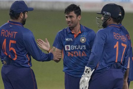 India's Ravi Bishnoi, center, celebrates with teammates the dismissal of West Indies' Roston Chase during the first Twenty20 international cricket match between India and West Indies in Kolkata, India, Wednesday, Feb. 16, 2022. (AP Photo/Bikas Das)