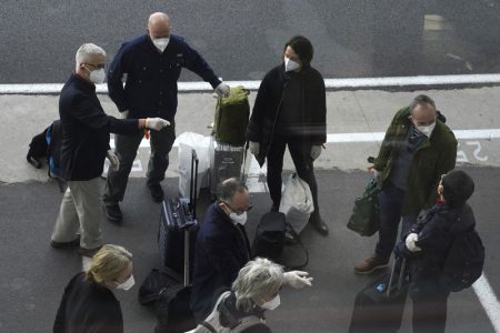 Members of a WHO team arrives in Wuhan in central China's Hubei province on Thursday, Jan. 14, 2021. The global team of researchers arrived Thursday in the Chinese city where the coronavirus pandemic was first detected to conduct a politically sensitive investigation into its origins amid uncertainty about whether Beijing might try to prevent embarrassing discoveries. Photo: AP
