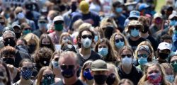 PLEASANTON, CA - JUNE 5: Protesters wear masks while attending a Black Lives Matter protest at Amador Valley Community Park in Pleasanton, Calif., on Friday, June 5, 2020. About 3,000 protesters gathered at Amador Valley Community Park and listened to speakers and then marched to the corner of Hopyard Road and Valley Ave. where they took a knee for 8 min and 46 seconds. (Jose Carlos Fajardo/Bay Area News Group)