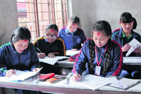 Rajani Rai ( first row in right ) disabilities student of Khagendra New Life Special Secondary school participate in a first day of Secondary Education Exam at Chamunda Secondary School Jorpati Kathmandu  on Thursday, March 16, 2017. The examination of English subject is being held across the Country.
Photo: Dinesh Gole/Nagarik/Republica