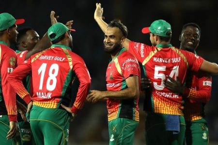 GROS ISLET, SAINT LUCIA - SEPTEMBER 25: In this handout image provided by CPL T20, Imran Tahir (C) of Guyana Amazon Warriors celebrates with teammates during the Hero Caribbean Premier League match between St Lucia Zouks and Guyana Amazon Warriors at Daren Sammy National Cricket Stadium on September 25, 2019 in Gros Islet, Saint Lucia. (Photo by Ashley Allen - CPL T20/Getty Images)