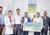 Gangalal cheque handover copy.jpg