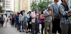 People line up to vote in district council elections in South Horizons in Hong Kong, China November 23, 2019. REUTERS/Laurel Chor