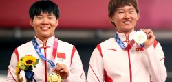 Tokyo 2020 Olympics - Cycling - Track - Women's Team Sprint - Medal Ceremony - Izu Velodrome, Shizuoka, Japan - August 2, 2021. Gold medallists Bao Shanju of China and Zhong Tianshi of China pose. REUTERS/Matthew Childs