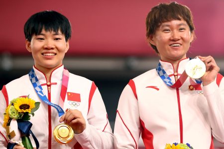 Tokyo 2020 Olympics - Cycling - Track - Women's Team Sprint - Medal Ceremony - Izu Velodrome, Shizuoka, Japan - August 2, 2021. Gold medallists Bao Shanju of China and Zhong Tianshi of China pose. REUTERS/Matthew Childs