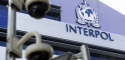 epa04703664 Security cameras pictured against the Interpol logo on the Interpol Global Complex for Innovation building (IGCI) in Singapore, 14 April 2015. Interpol's first digital crime centre was officially opened in Singapore on 13 April 2015. Complementing its headquarters in Lyon, the Interpol Global Complex for Innovation (ICGI) will support international policing efforts against cybercrime, as well as research and capacity building in online security.  EPA/WALLACE WOON