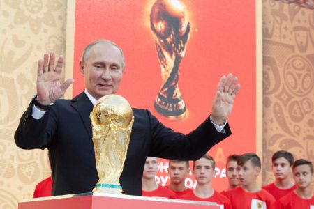 FIFA President Gianni Infantino and President of Russian Federation Vladimir Putin stay on the stage with a Trophy during FIFA World Cup Trophy Tour at Luzhniki stadium on September 9, 2017 in Moscow, Russia. (Oleg Nikishin/FIFA/Getty Images)