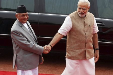 Nepal's Prime Minister Khadga Prasad Sharma Oli (L) shakes hands with his Indian counterpart Narendra Modi during his ceremonial reception at the forecourt of India's Rashtrapati Bhavan presidential palace in New Delhi, India, February 20, 2016. REUTERS/Adnan Abidi - GF10000316261