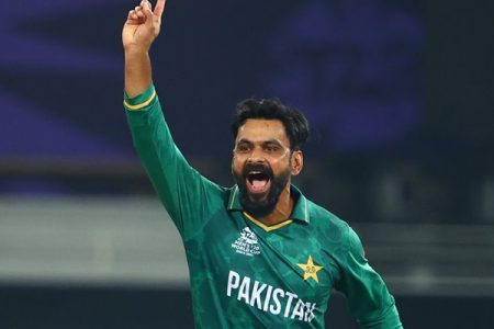 DUBAI, UNITED ARAB EMIRATES - OCTOBER 24: Mohammad Hafeez of Pakistan unsuccessfully appeals for the wicket of  Rishabh Pant of India during the ICC Men's T20 World Cup match between India and Pakistan  at Dubai International Stadium on October 24, 2021 in Dubai, United Arab Emirates. (Photo by Francois Nel/Getty Images)