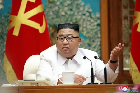 This picture taken on July 25, 2020 and released from North Korea's official Korean Central News Agency (KCNA) on July 26 shows North Korean leader Kim Jong Un attending an emergency enlarged meeting of Political Bureau of WPK Central Committee at an undisclosed location. (Photo by STR / KCNA VIA KNS / AFP) / - South Korea OUT / ---EDITORS NOTE--- RESTRICTED TO EDITORIAL USE - MANDATORY CREDIT "AFP PHOTO/KCNA VIA KNS" - NO MARKETING NO ADVERTISING CAMPAIGNS - DISTRIBUTED AS A SERVICE TO CLIENTS / THIS PICTURE WAS MADE AVAILABLE BY A THIRD PARTY. AFP CAN NOT INDEPENDENTLY VERIFY THE AUTHENTICITY, LOCATION, DATE AND CONTENT OF THIS IMAGE --- /