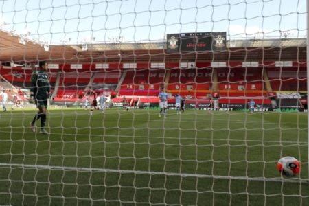 Manchester City's goalkeeper Ederson reacts after Southampton's Che Adams scored his team's first goal during the English Premier League soccer match between Southampton and Manchester City at St. Mary's Stadium in Southampton, England, Sunday, July 5, 2020. (AP Photo/Frank Augstein,Pool)