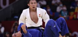 Tokyo 2020 Olympics - Judo - Men's 60kg - Semifinal - Nippon Budokan - Tokyo, Japan - July 24, 2021. Naohisa Takato of Japan reacts after performing the winning move against Yeldos Smetov of Kazakhstan REUTERS/Hannah Mckay