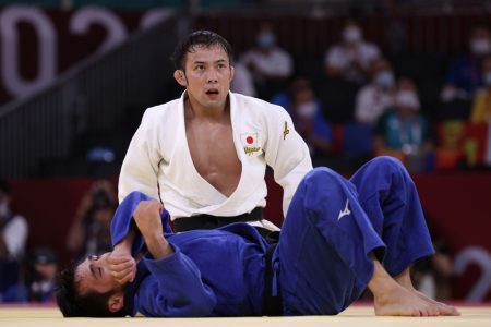 Tokyo 2020 Olympics - Judo - Men's 60kg - Semifinal - Nippon Budokan - Tokyo, Japan - July 24, 2021. Naohisa Takato of Japan reacts after performing the winning move against Yeldos Smetov of Kazakhstan REUTERS/Hannah Mckay