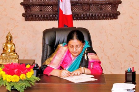 President Bidya Devi Bhandari approves bill endorsed by the Legislature-Parliament at the latter's Presidential Office at Sheetal Niwas, in Kathmandu, on Thursday, December 22, 2016. Photo Courtesy: President's Office