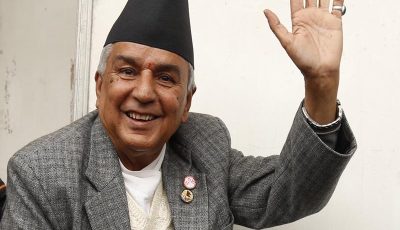 Nepali Congress President candidate Ram Chandra Paudel waves while casting vote in the election during the party's 13th national general convention in Kathmandu on Sunday, March 6, 2016. Photo: RSS