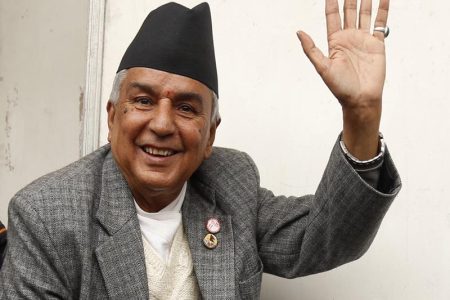 Nepali Congress President candidate Ram Chandra Paudel waves while casting vote in the election during the party's 13th national general convention in Kathmandu on Sunday, March 6, 2016. Photo: RSS