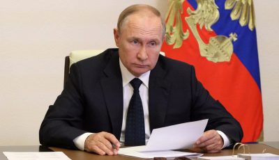 Russian President Vladimir Putin takes part in a televised meeting with officials to discuss forest fires at a residence outside Moscow, Russia August 24, 2022. Sputnik/Mikhail Klimentyev/Kremlin via REUTERS