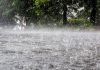 Torrential rain causing flood.