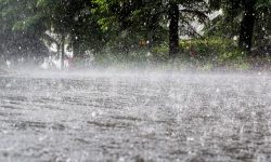 Torrential rain causing flood.