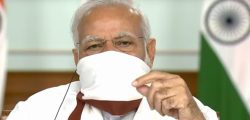**EDS: VIDEO GRAB** New Delhi: Prime Minister Narendra Modi wearing a protective mask chairs a meeting with chief ministers on COVID-19 lockdown via video conference, in New Delhi, Saturday, April 11, 2020. (PTI Photo)
(PTI11-04-2020_000044B)