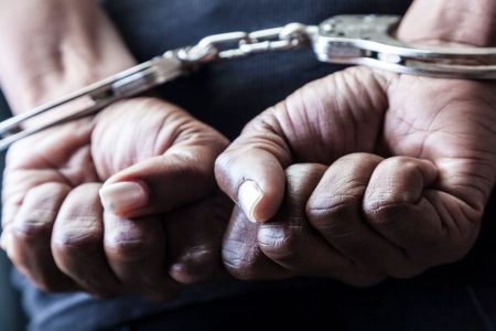 Person in handcuffs