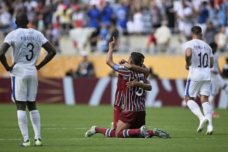 Fluminense's Thiago Santos, left, and Thiago Silva celebrate after the Club World Cup quarterfinal soccer match between Fluminense and Al Hilal in Orlando, Fla., Friday, July 4, 2025. (AP Photo/Phelan M. Ebenhack)