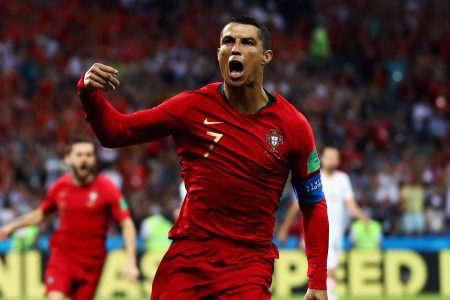 SOCHI, RUSSIA - JUNE 15:  Cristiano Ronaldo of Portugal celebrates after scoring his team's first goal during the 2018 FIFA World Cup Russia group B match between Portugal and Spain at Fisht Stadium on June 15, 2018 in Sochi, Russia.  (Photo by Dean Mouhtaropoulos/Getty Images)