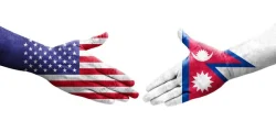 depositphotos_616926268-stock-photo-handshake-nepal-usa-flags-painted